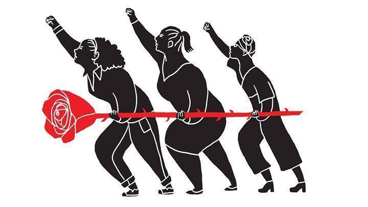 Three women with raised fists holding a large red rose