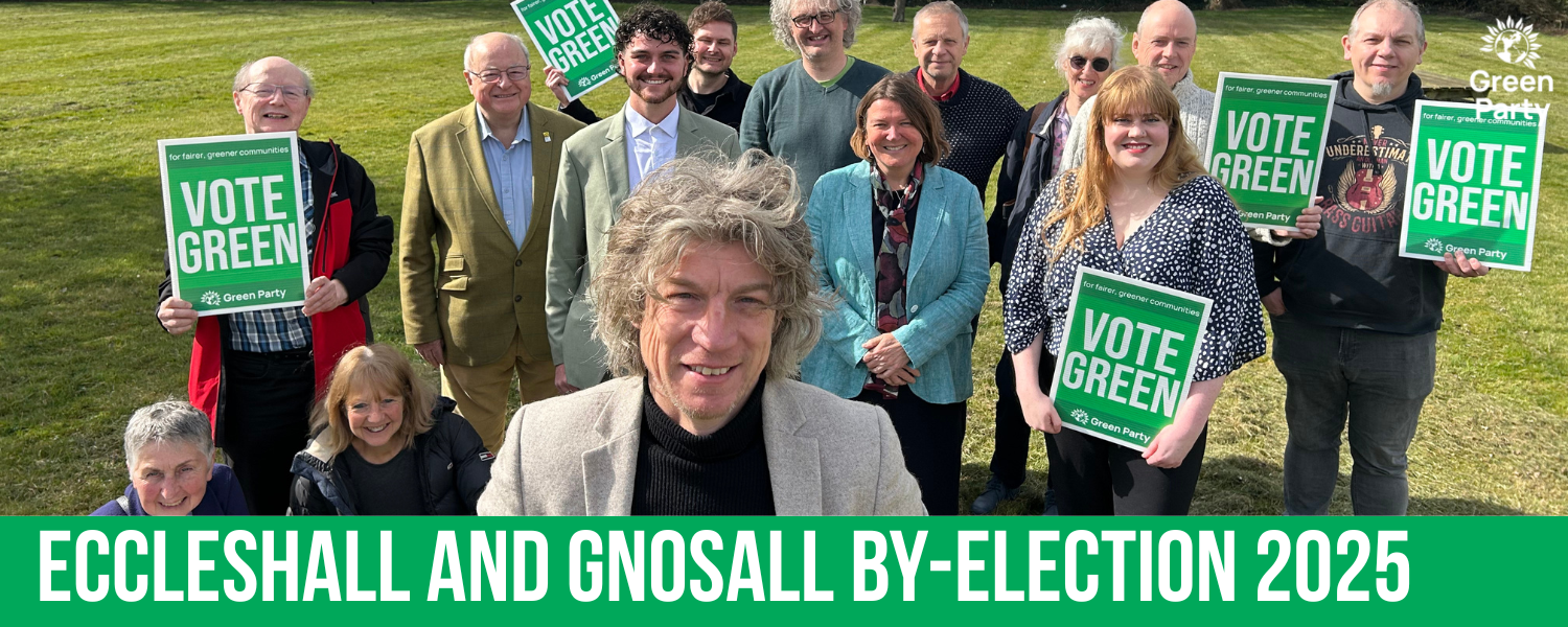 Group of people around Scott Spencer holding "vote Green" signs with the caption "Eccleshall and Gnosall By-Election 2025"