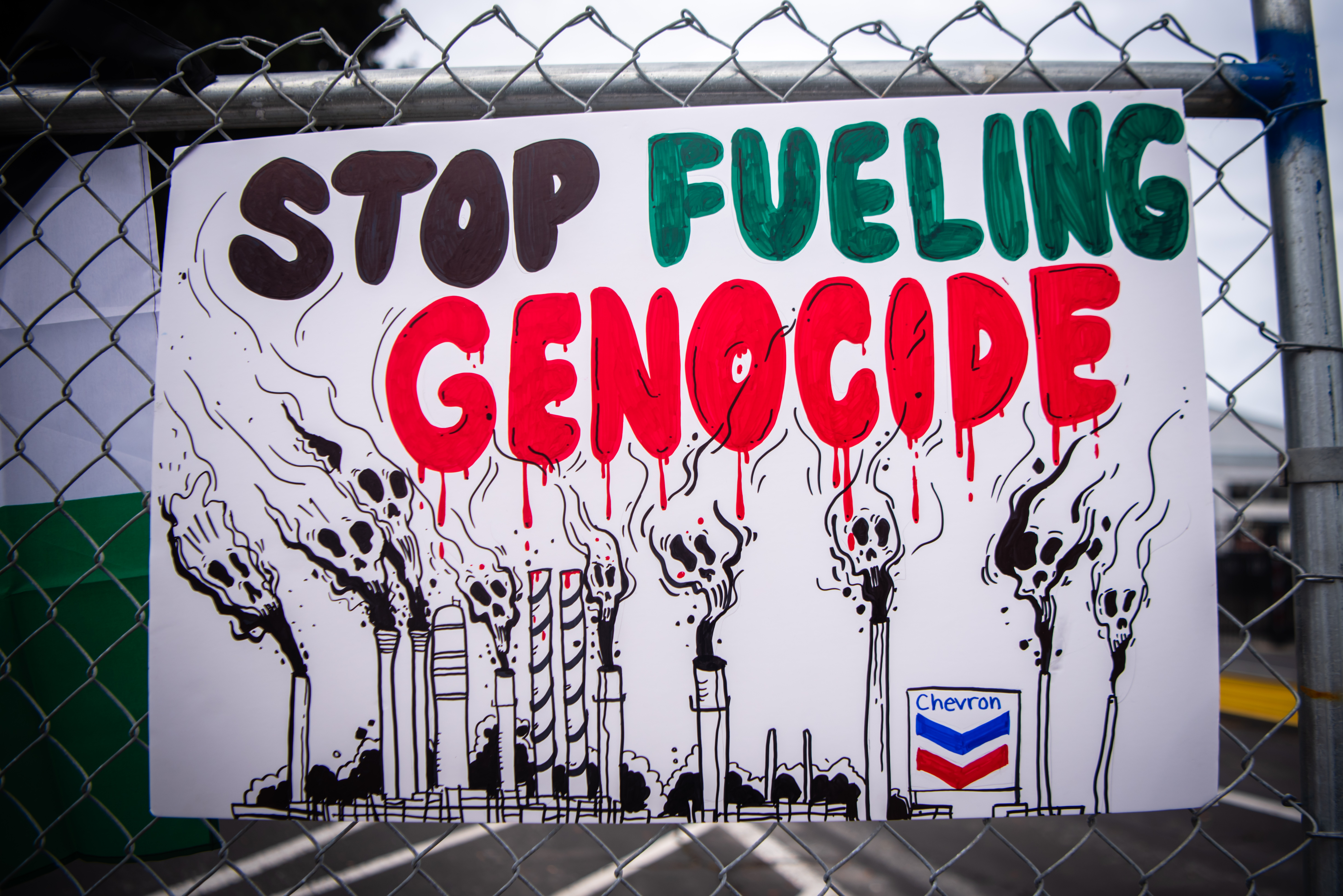 Stop Fueling Genocide poster 