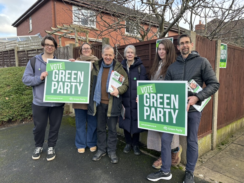 Green Party members going off canvassing with Vote Green signs
