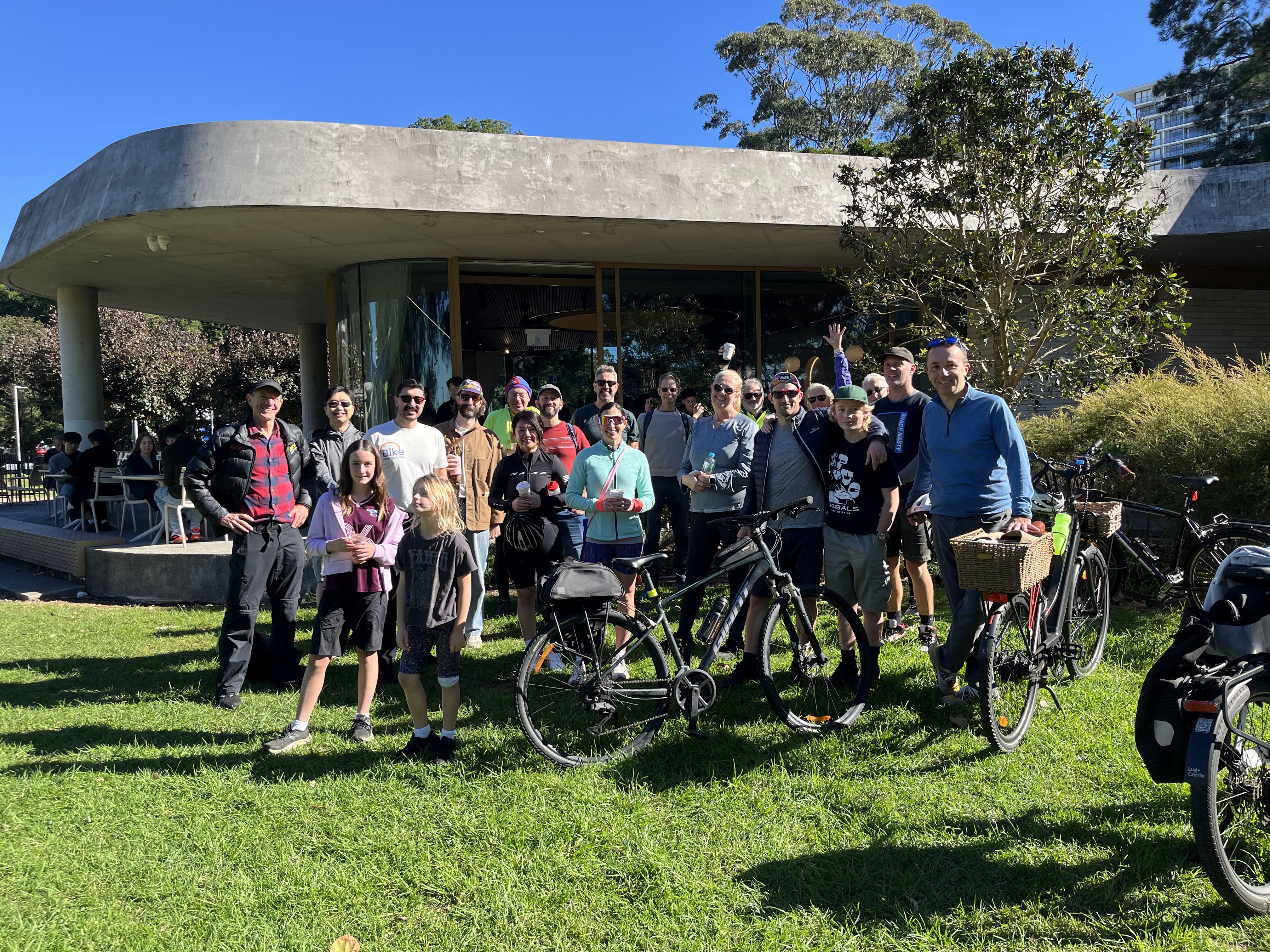 Group of happy riders outside a cafe, following a previous Bike Marrickville event