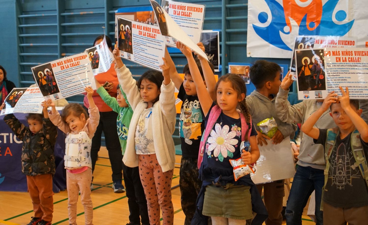 Kids at community meeting