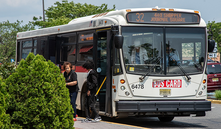 Local residents boarding the bus