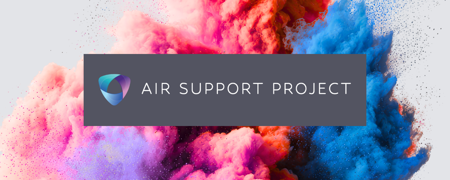 Air Support Project logo centered on a dark gray banner over a vivid background of swirling pink, purple, and blue powder clouds. The logo features a rounded triangular mark in shades of blue and purple beside the words “Air Support Project” in light gray text.
