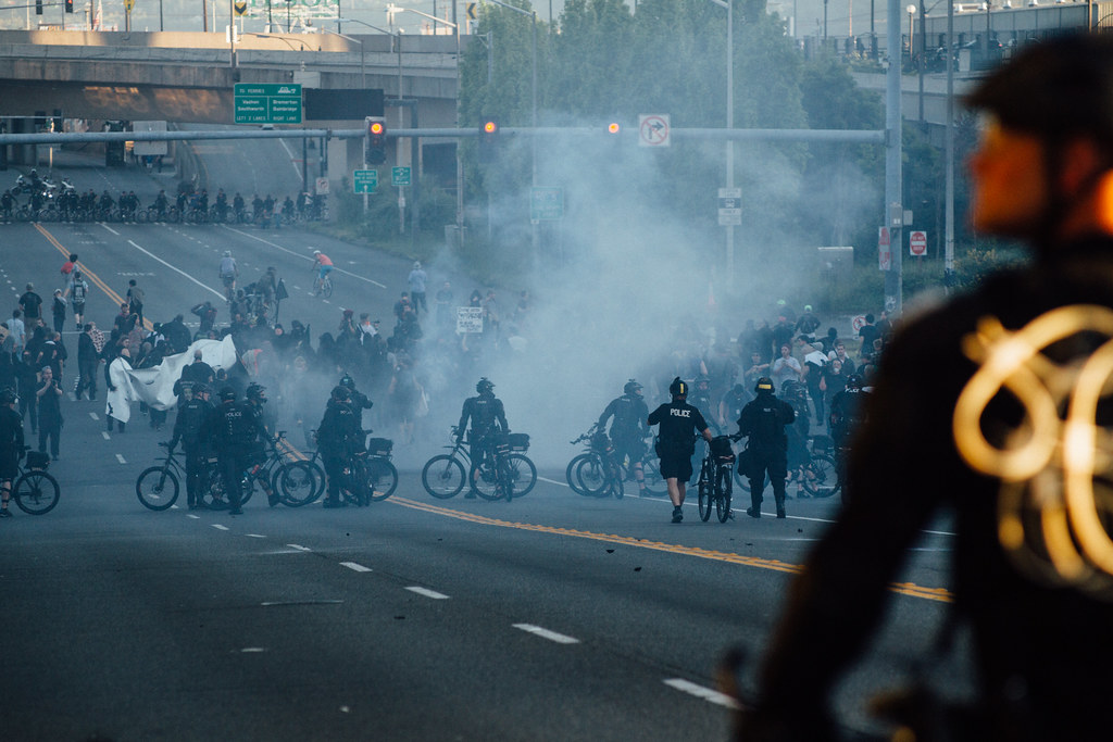 Tear gas being sprayed by police
