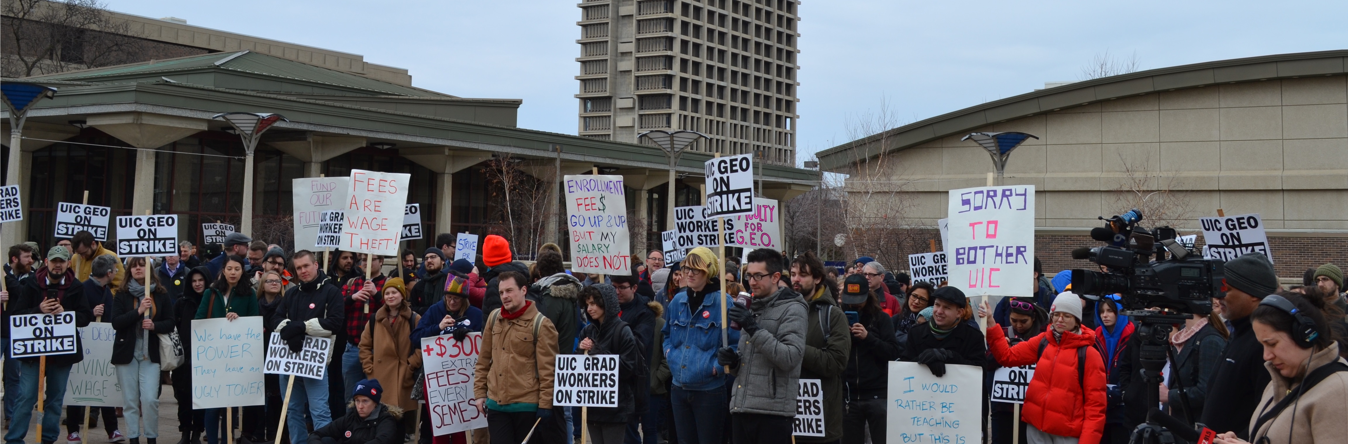 Crowd of striking GEO members in front of University Hall
