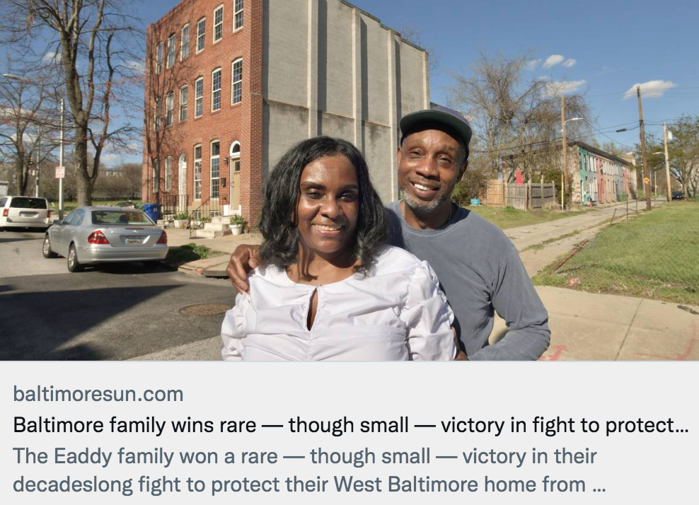 Eaddys in front of their home 