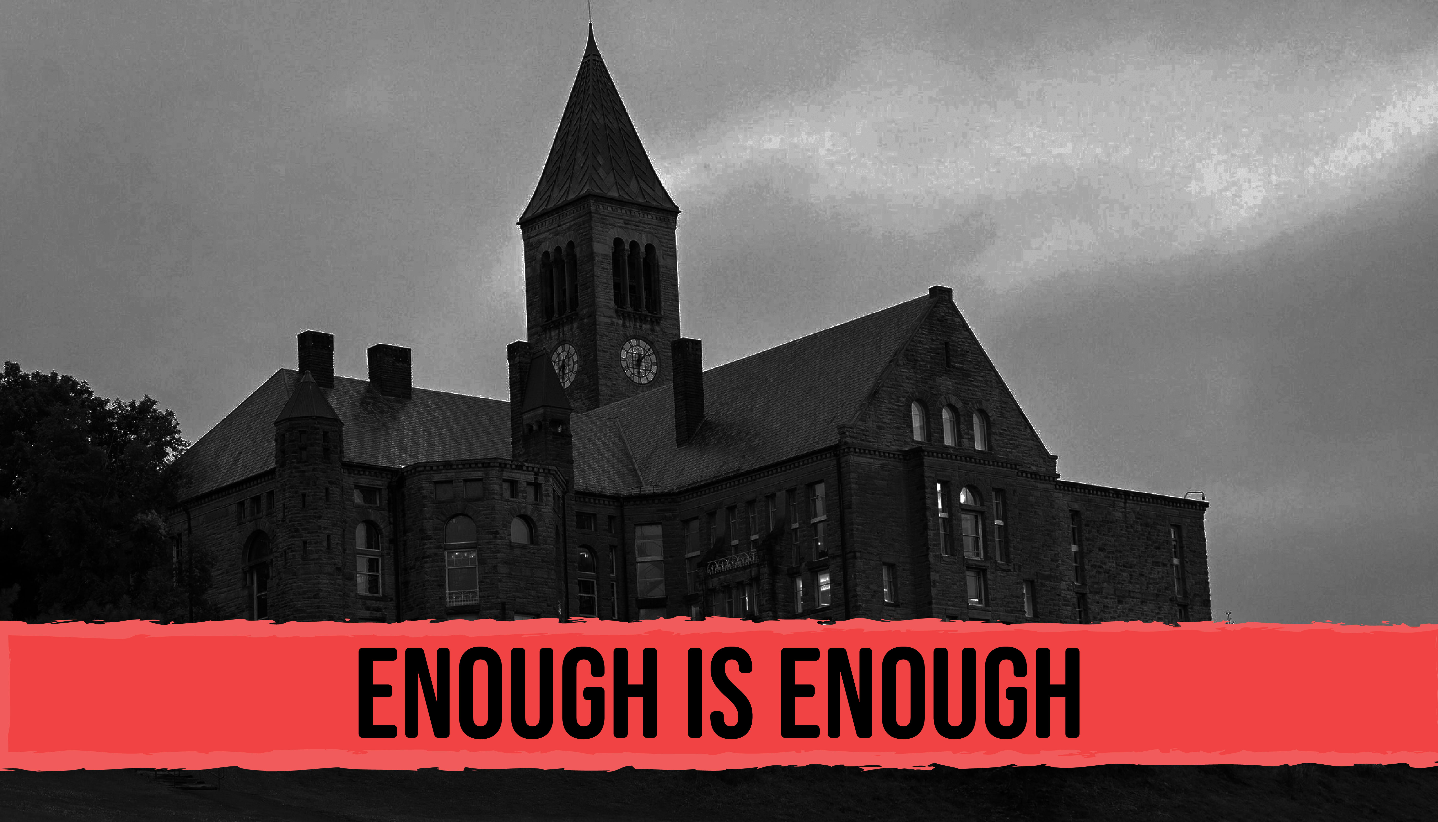 Cornell University in dark shadow behind "Enough is Enough"