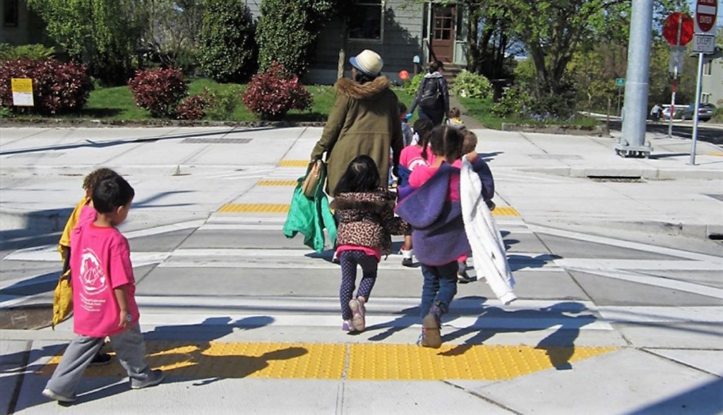 kids walking with parent to school