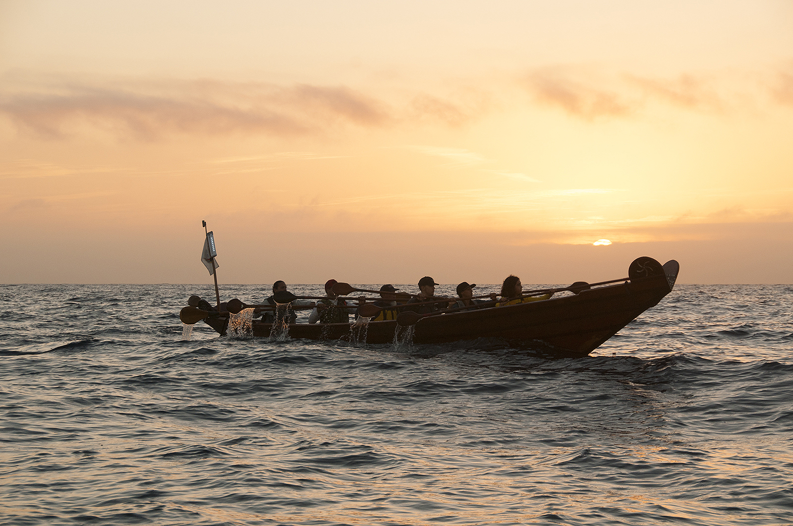 Tomol crossing at sunrise