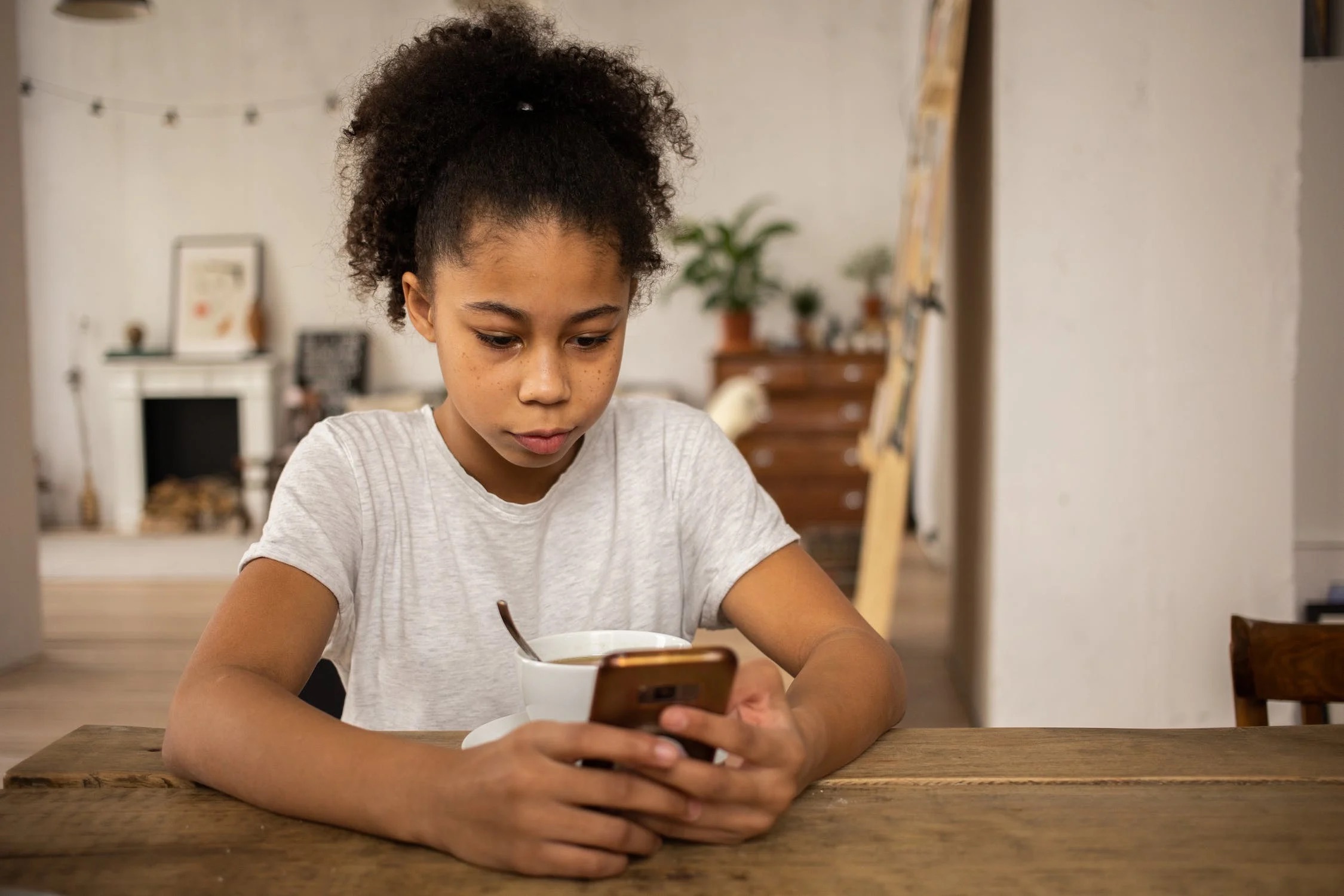 Young girl using a cellphone 