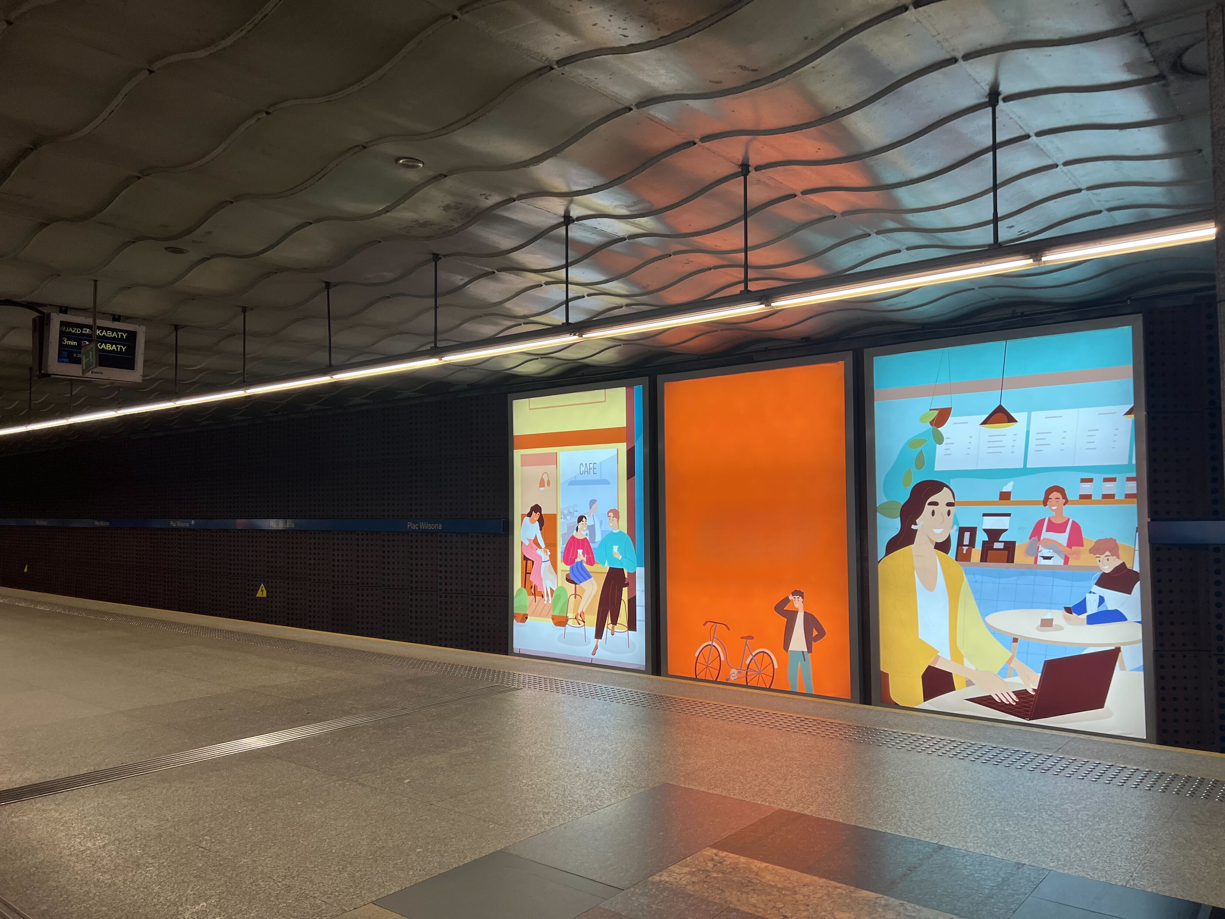 Reklamy na stacji metra Plac Wilsona