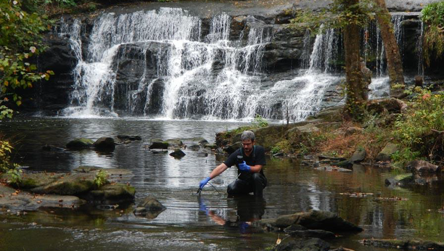 Black Warrior Riverkeeper's Staff Scientist, John Kinney, tests water quality downstream of Tyson's Blountsville slaughterhouse