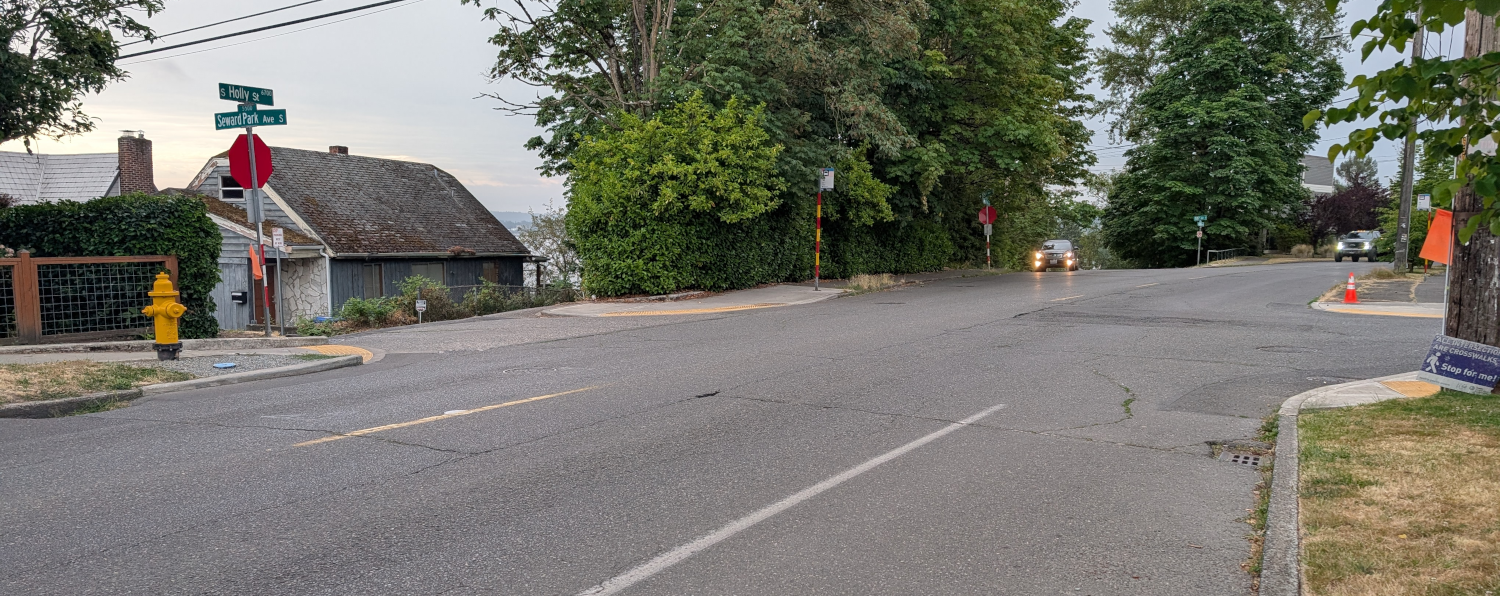 Photo of a intersection on Seward Park Ave S that does not have any crosswalks.
