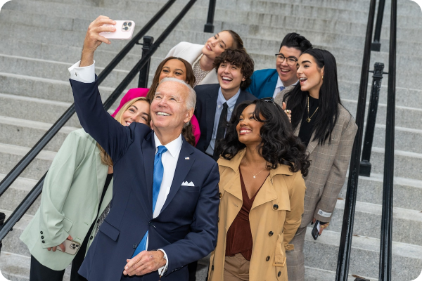 President Biden poses for a photo with TikTok influencers