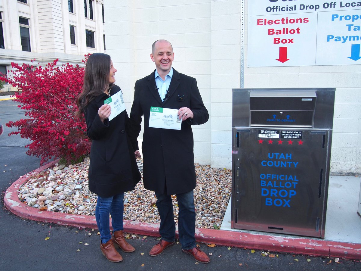 Evan & Emily McMullin returning their ballots