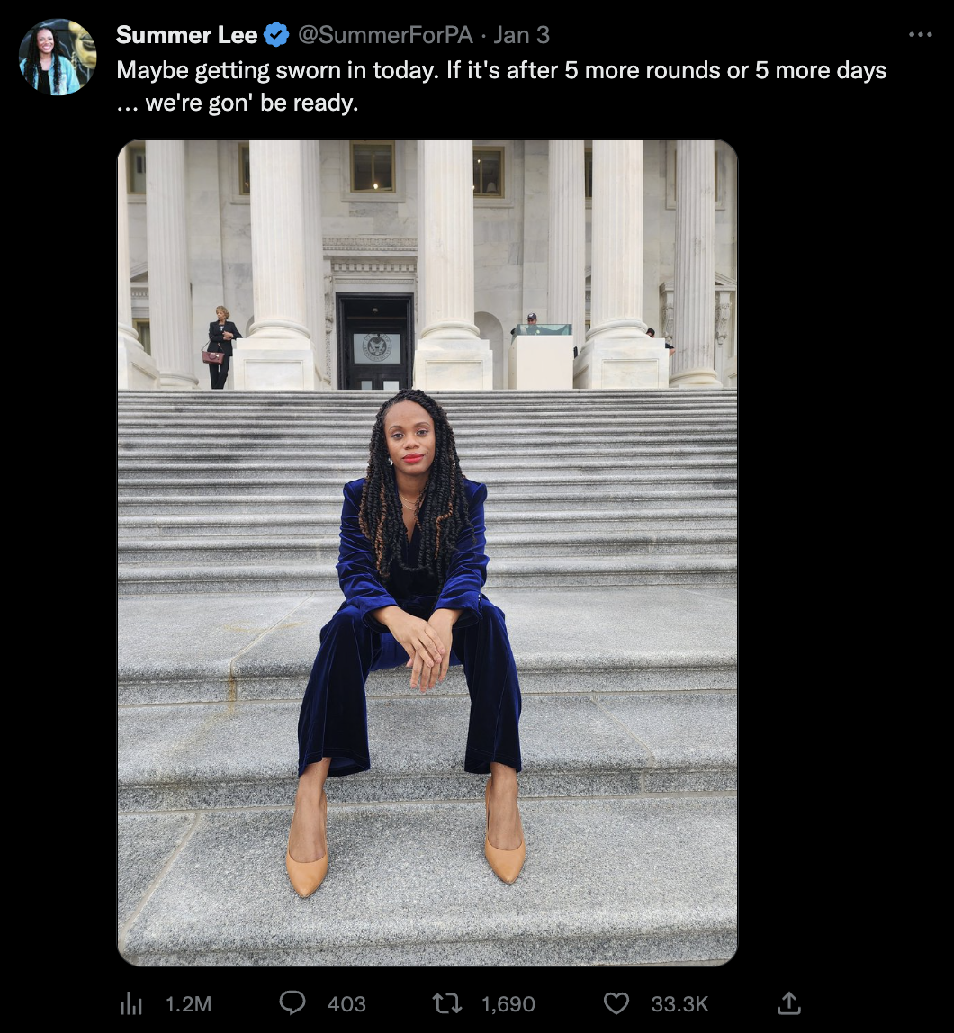 Rep-Elect Summer Lee sits on the steps of Congress