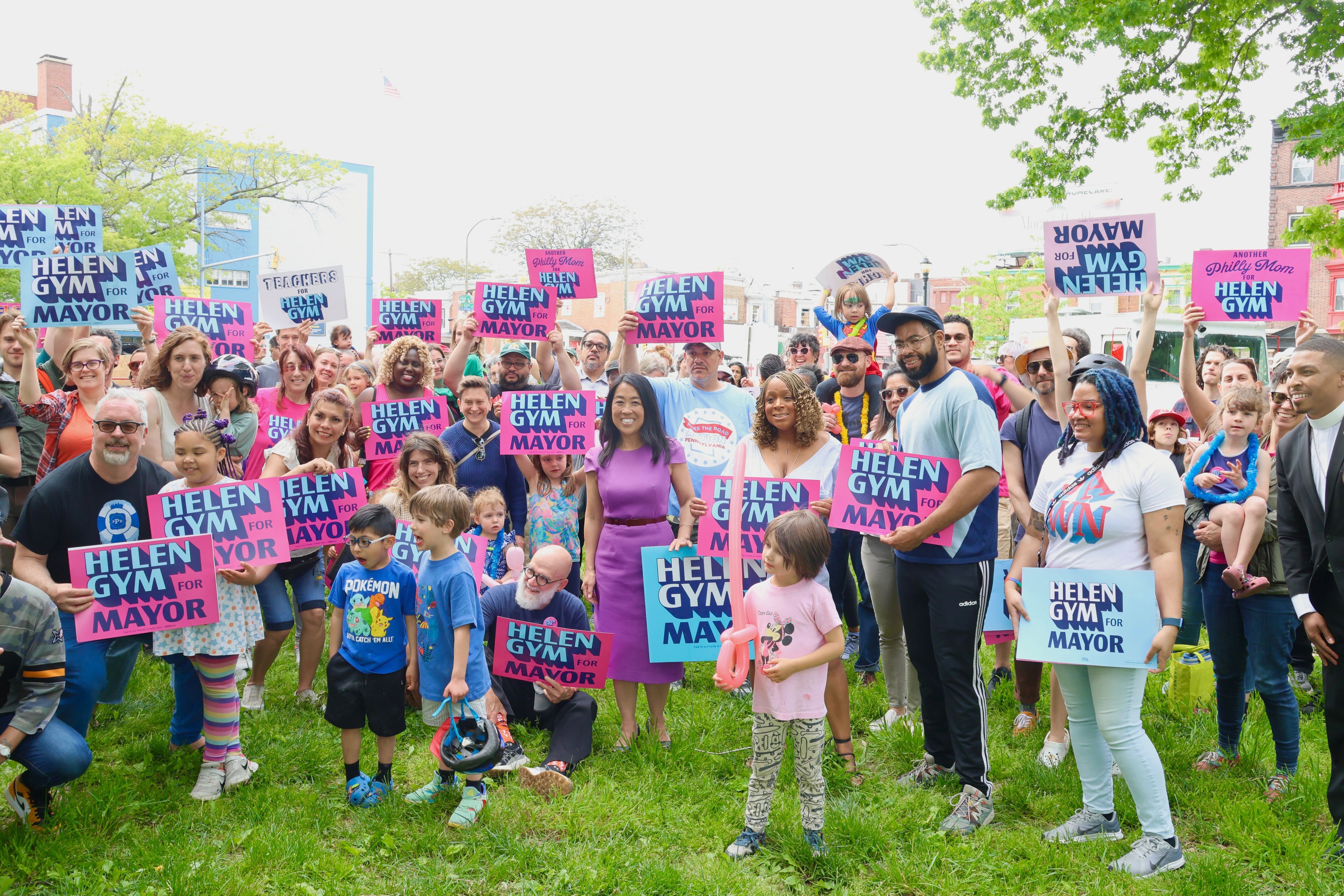 Photo of Helen Gym with community members