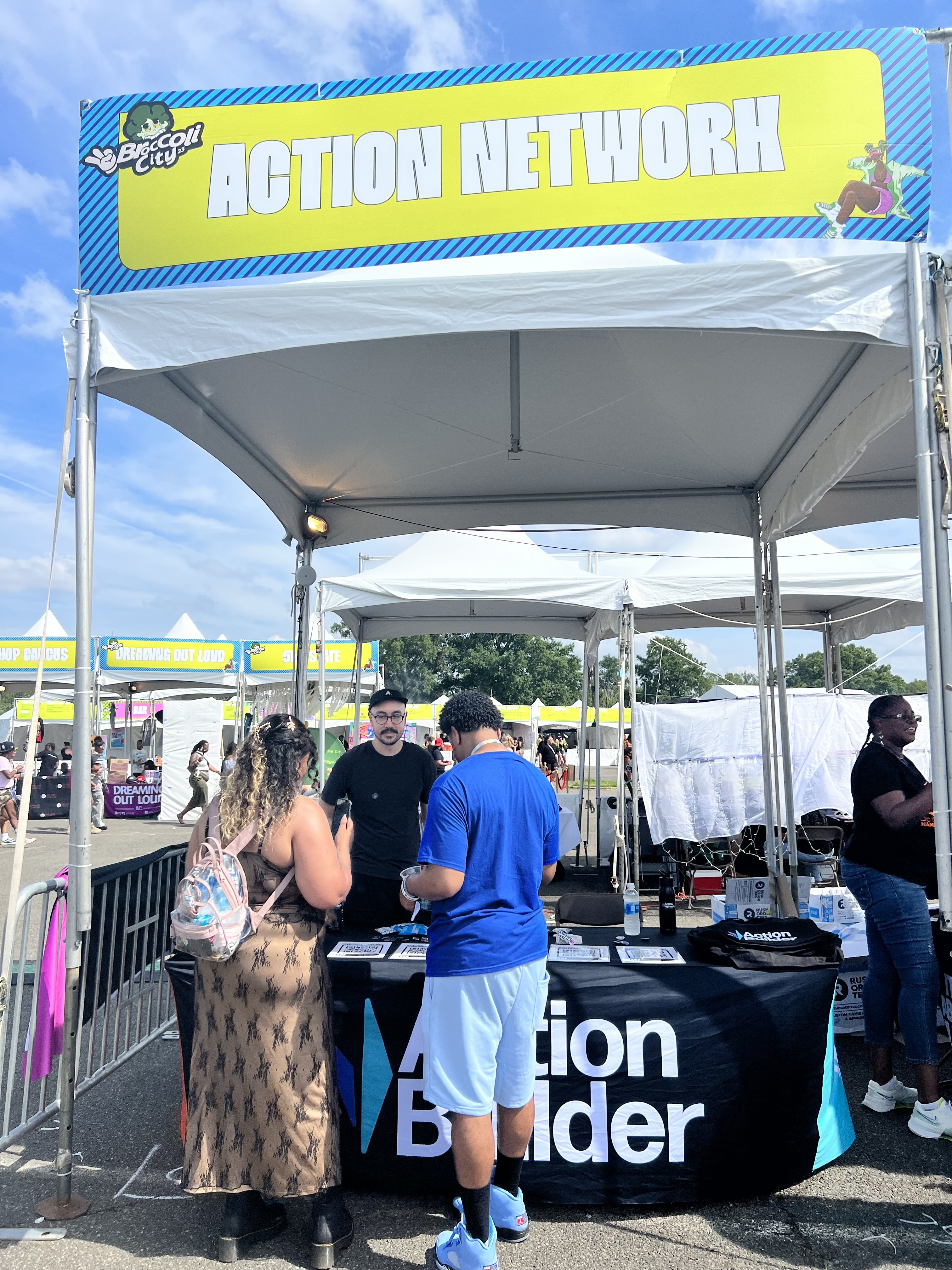 An image of the Action Network & Action Builder booth at the Broccoli City Festival in Washington, D.C.