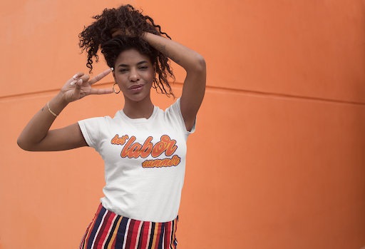 Woman shares a peace sign wearing a hot labor summer shirt