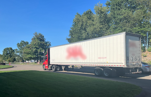 The truck carrying all of the Dark Brandon mugs