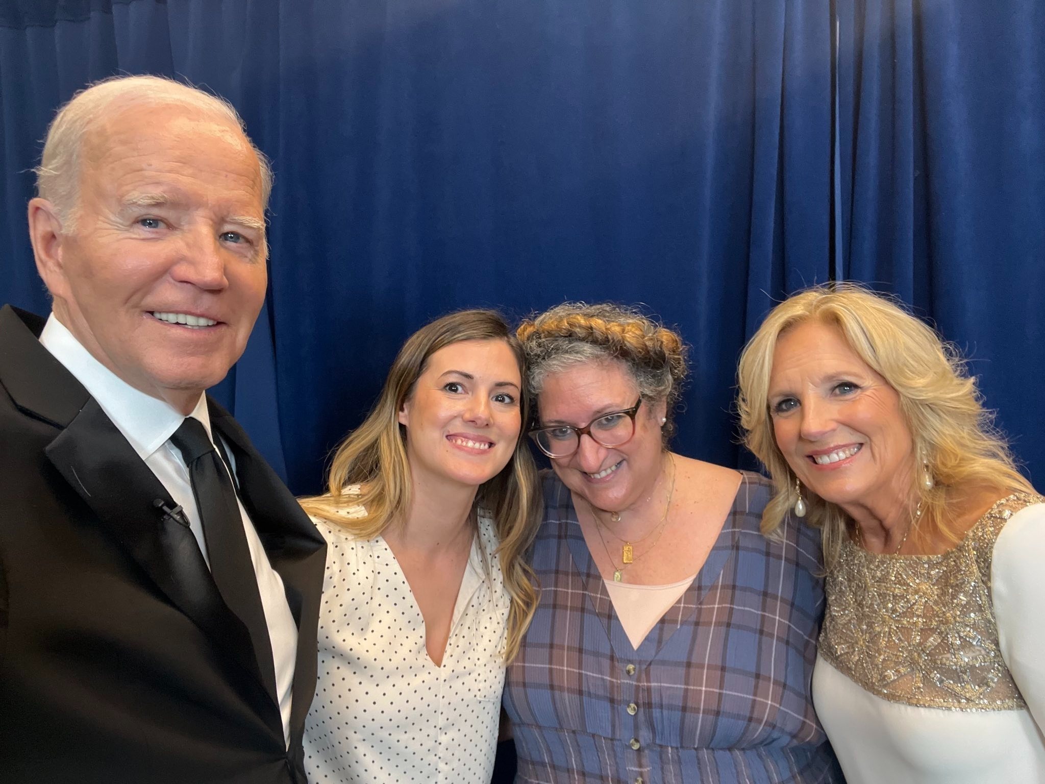 Joe and Jill Biden smiling with the winners of the last meet the Bidens contest.