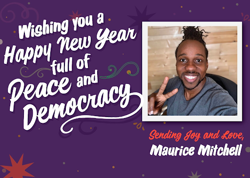 Image of holiday postcard. Reads "Wishing you a Happy New Year full of Peace and Democracy. Sending joy and love, Maurice Mitchell." Photo of Maurice.