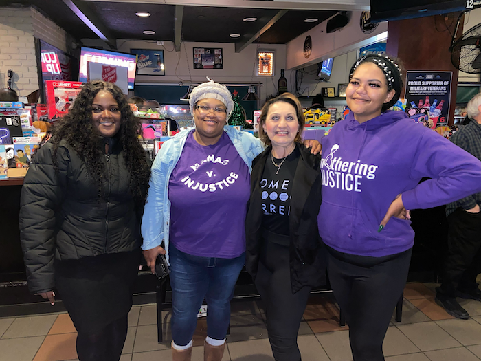 A few of the Mamavists from Mothering Justice posing at a recent event