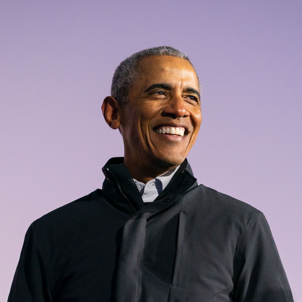 A picture of Barack Obama smiling and looking to his right.