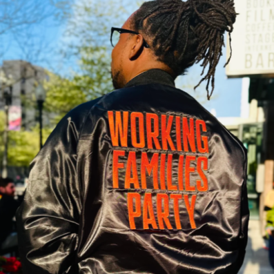 Black bomber jacket with orange WFP logo