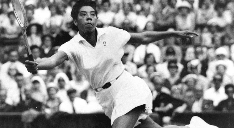 Photo of Althea Gibson playing tennis. 