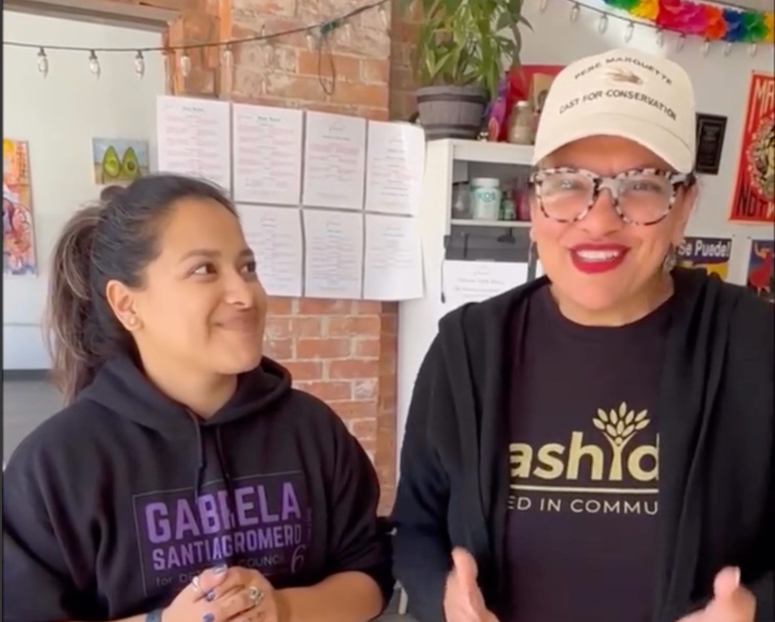 Screenshot of Rashida and Gaby directly addressing the camera
