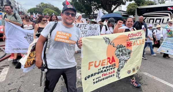 Corporate Accountability staff and activists march at the People's Summit