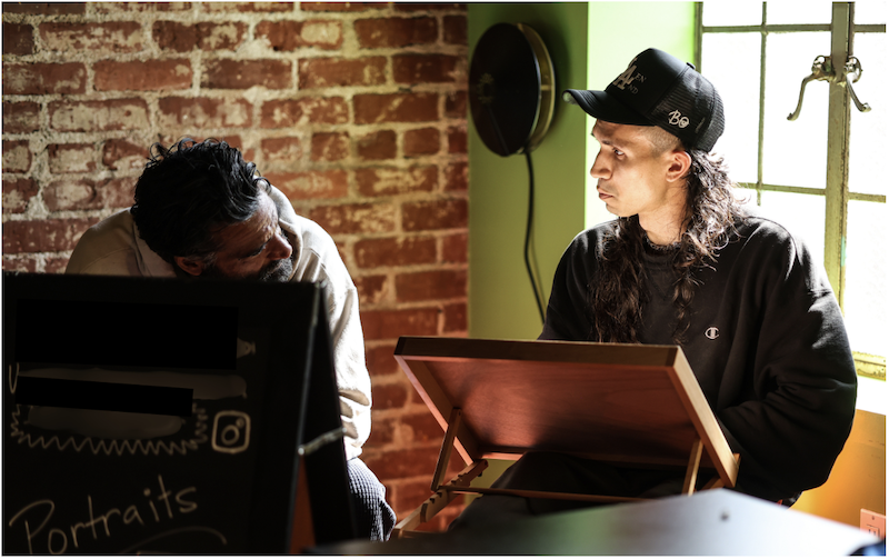 Local LA artists chat during UWD culture and community event.