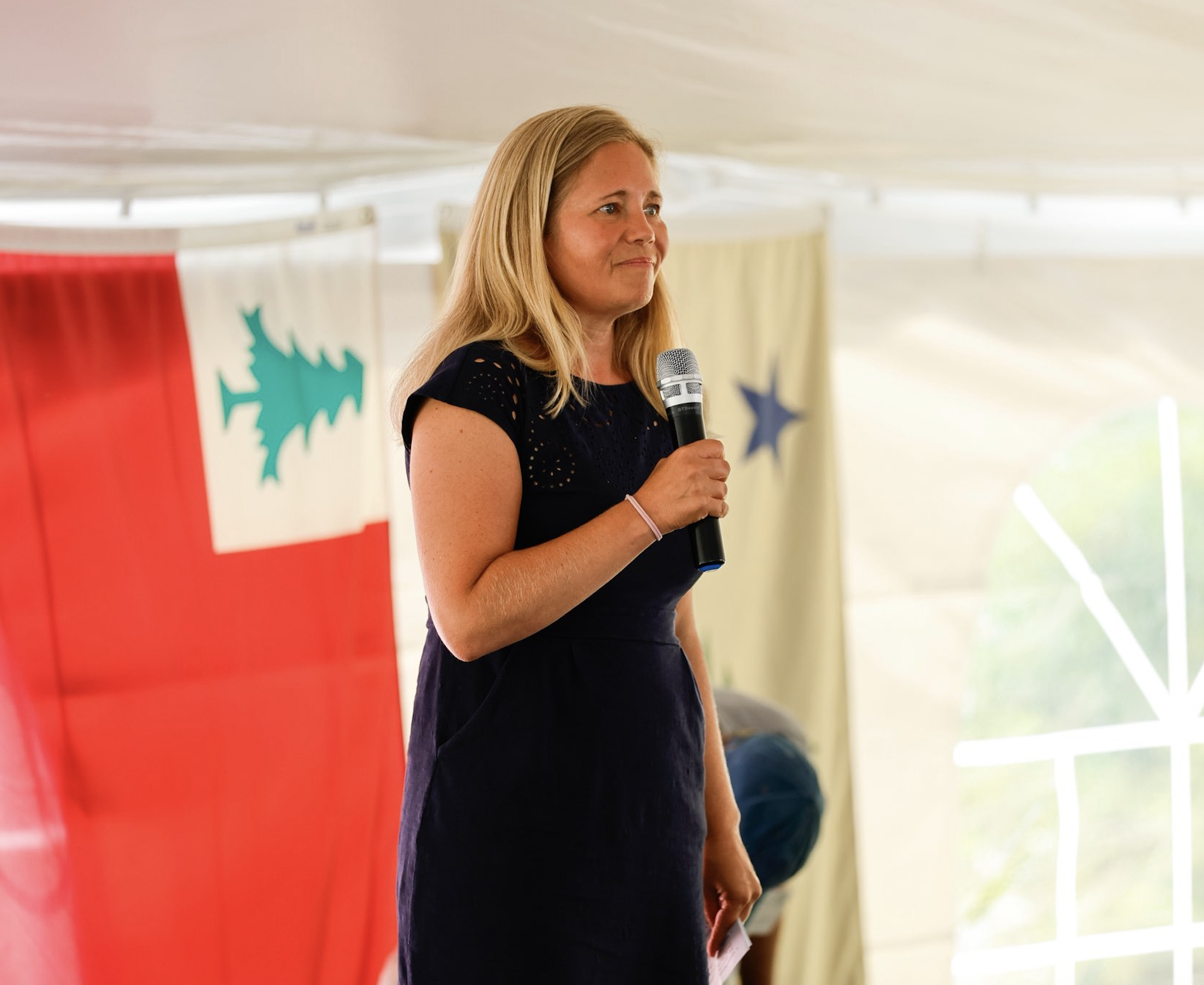Hannah speaking at event