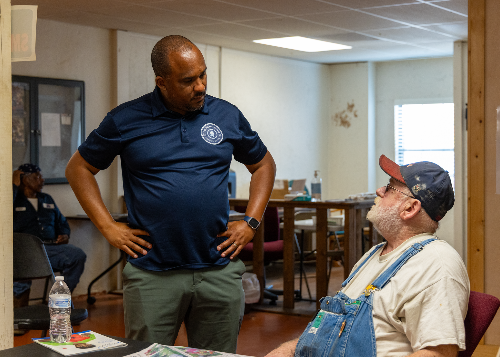 Scott Colom talking with a voter