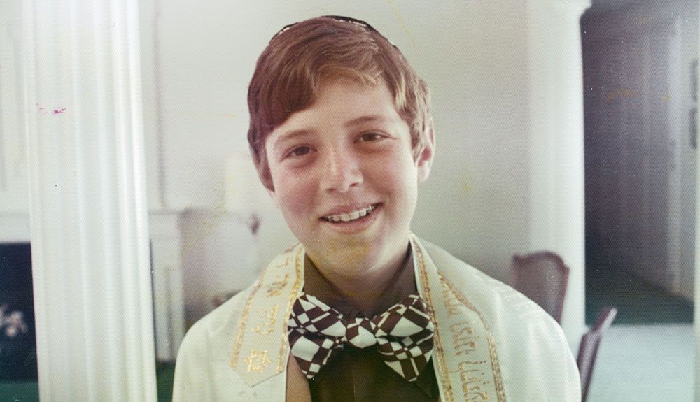 a photo of young Adam during his Bar Mitzvah