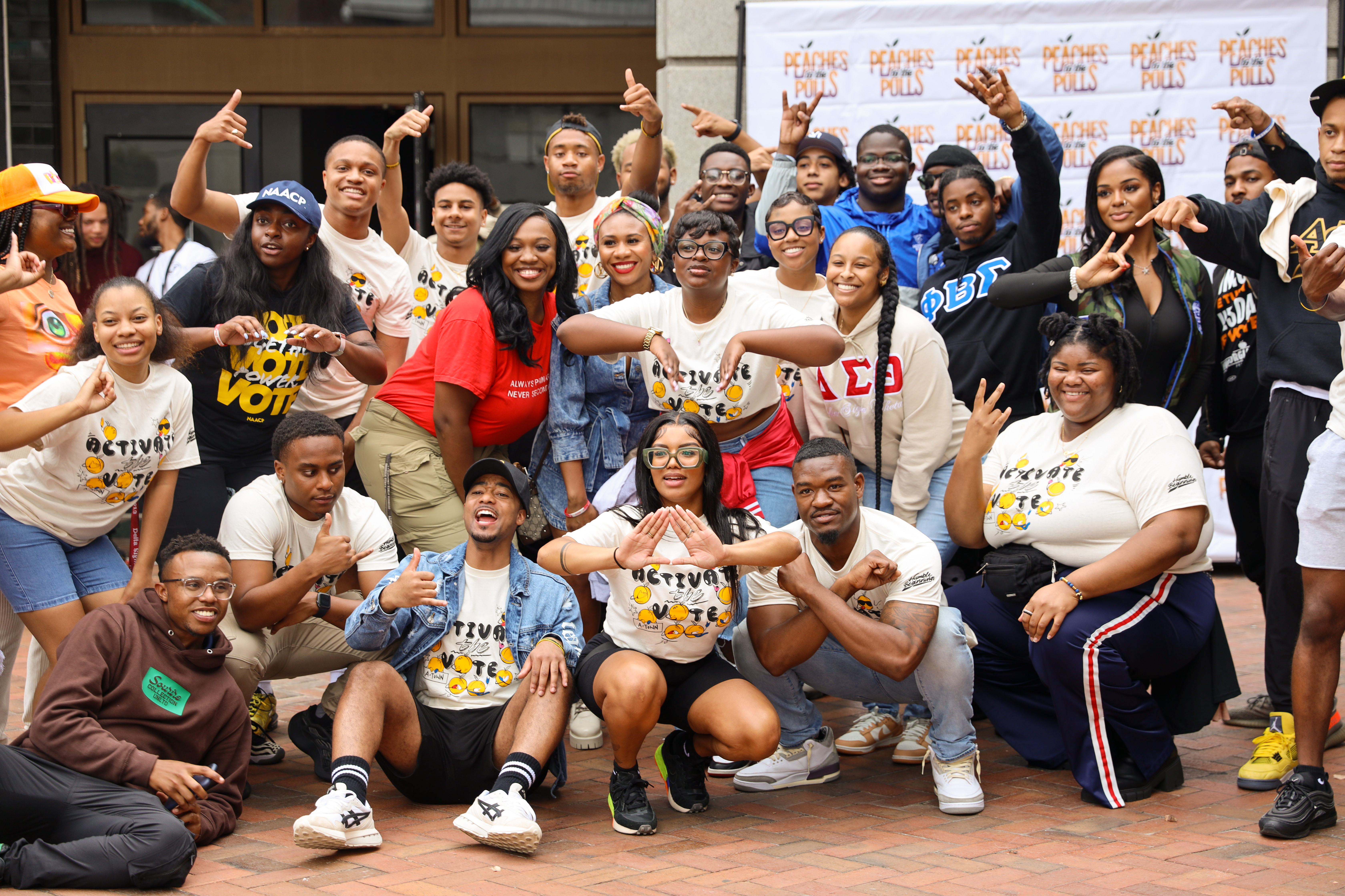 Activists celebrate at our Peaches to the Polls Block Party in October