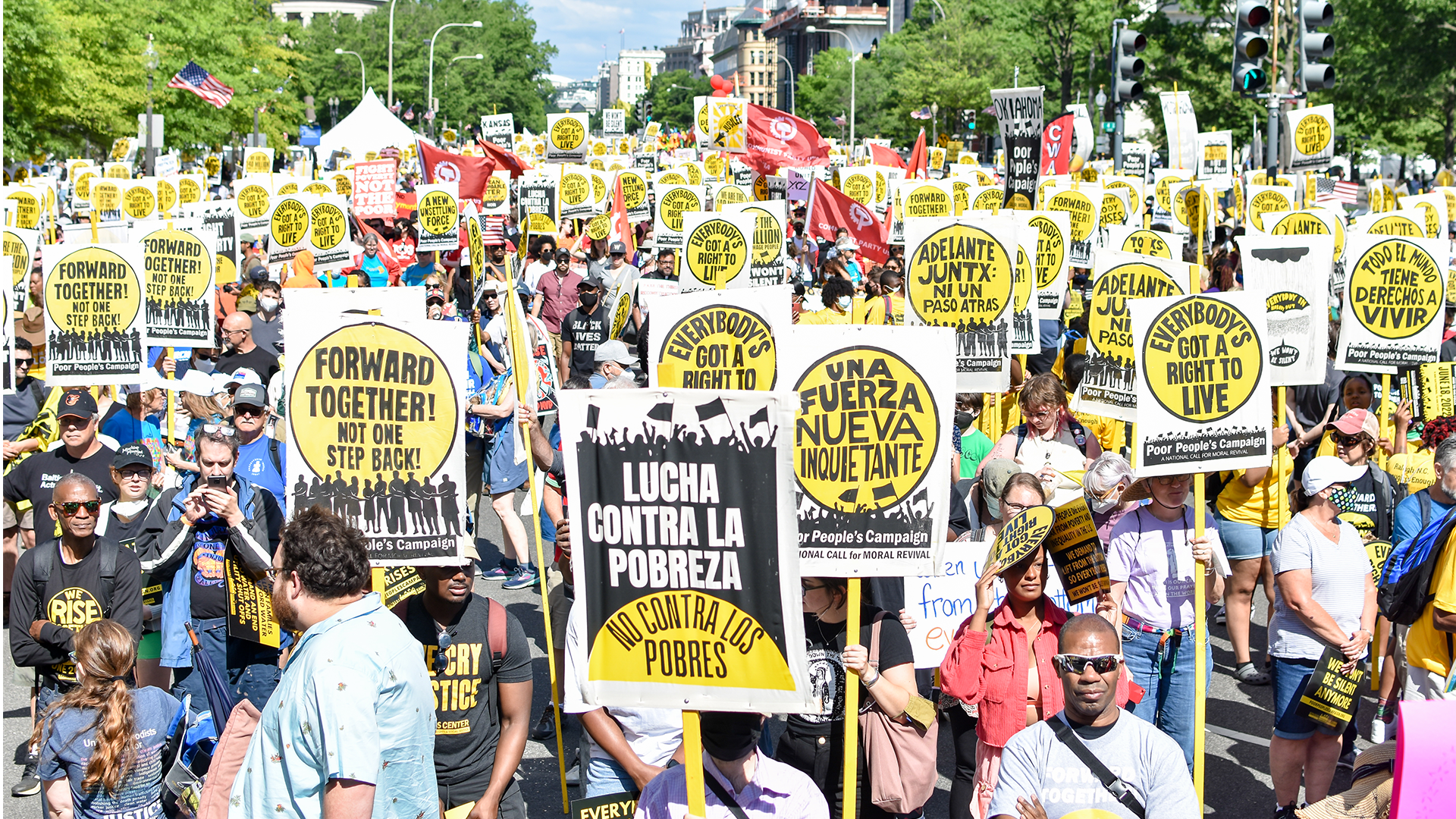 Picture by Emily Farthing from The Mass Poor People’s and Low-Wage Workers’ Assembly and Moral March on Washington and to the Polls . There are thousands of activists holding signs that read 