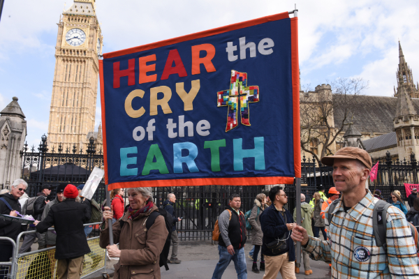 Colourful banner saying Hear the cry of the Earth