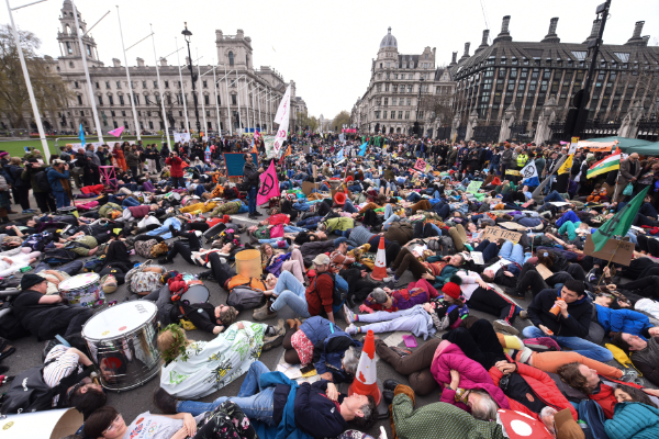 Tens of thousands at march join mass die-in.