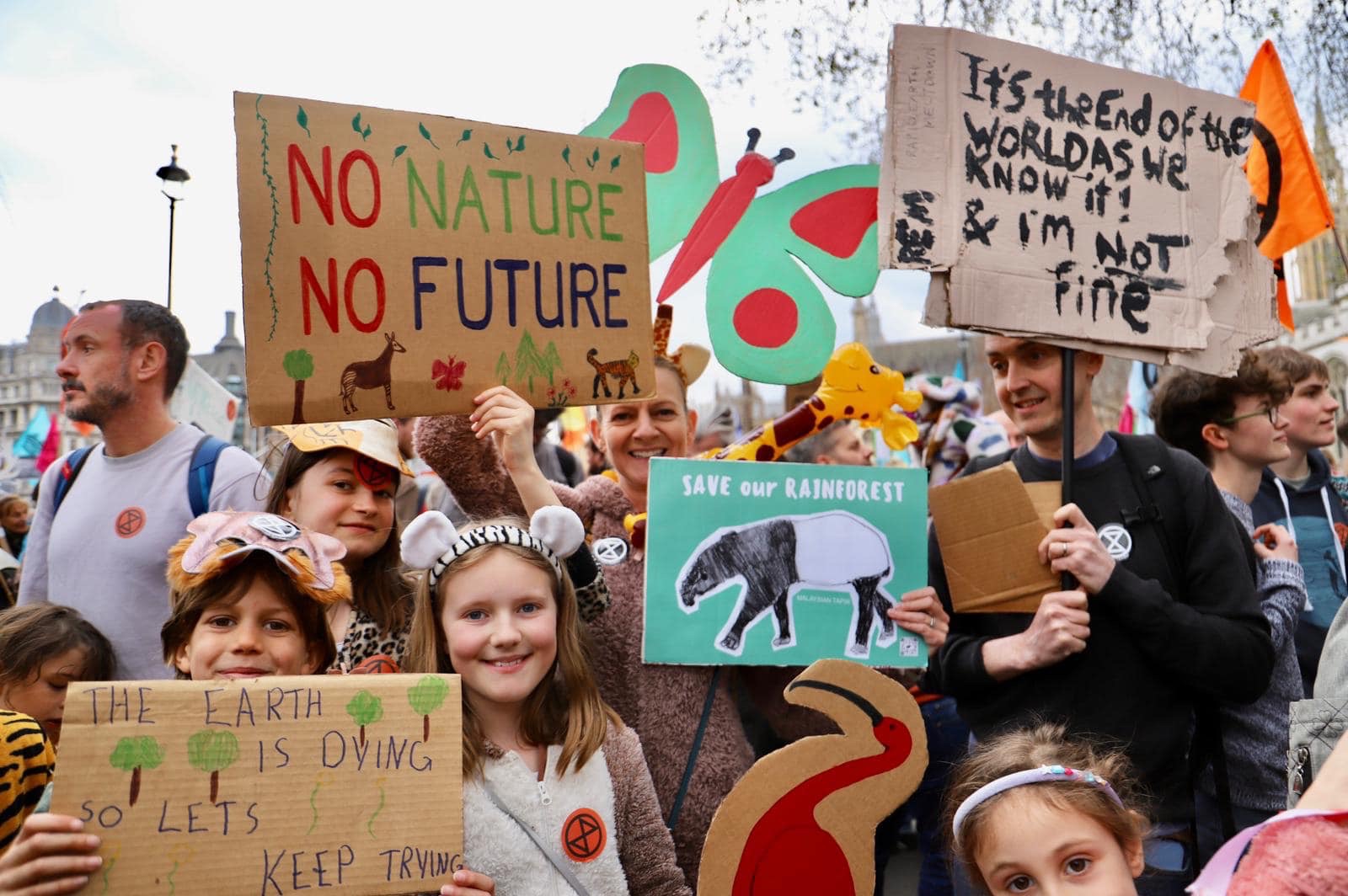 Photo showing a group of people with posters