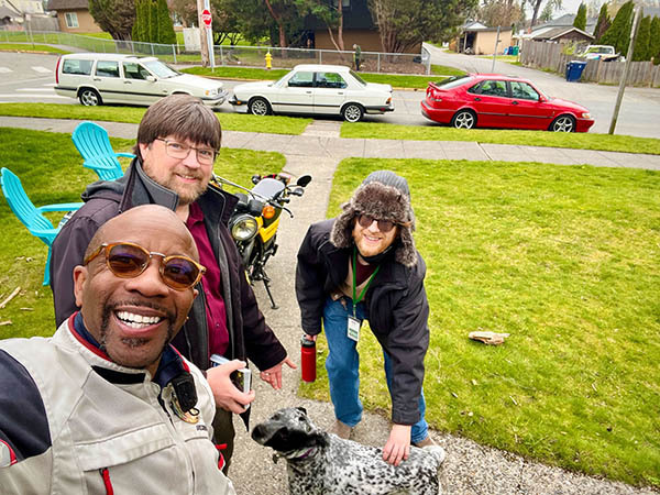 A selfie taken by a supporter showing Jason and Scott greeting his dog Pepper.