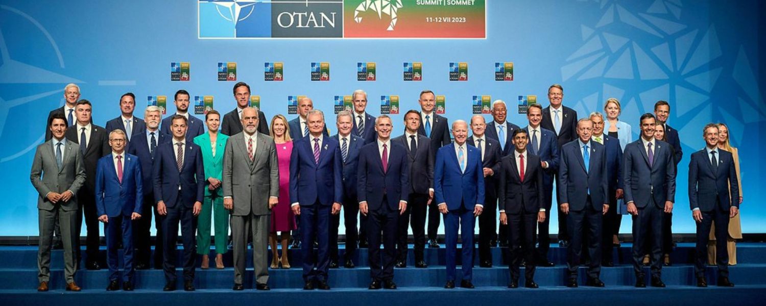 NATO leaders stand for family photo at 2023 NATO summit