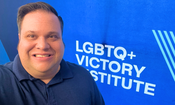 A photo of David at an event for the LGBTQ+ Victory Institute.