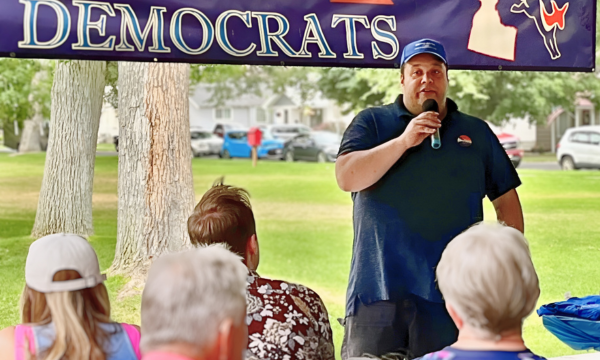 A photo of David speaking to voters at the Bonneville County Democrats annual picnic on Saturday, July 27th.