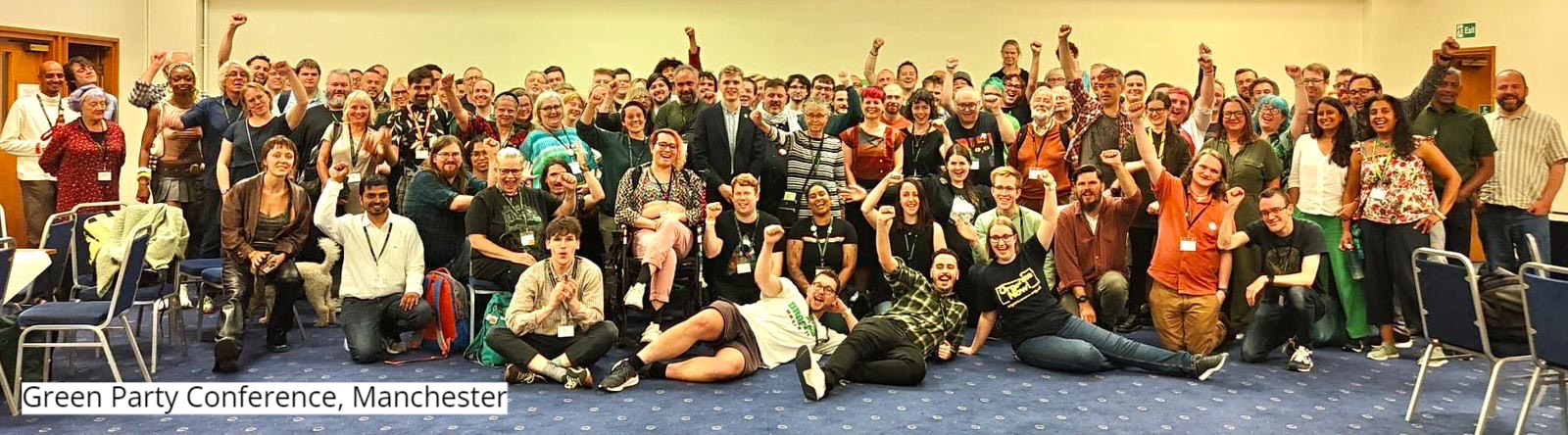 Attendees posing at the Green Party conference in Manchester