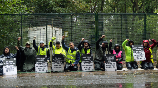 Ten Extinction Rebellion campaigners blocking the entrance to the UK Oil & Gas Horse Hill oil extraction site in Surrey