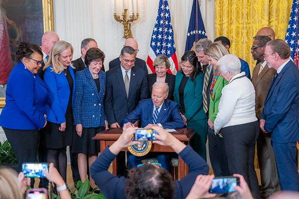 A picture of President Biden signing the Social Security Fairness Act into law. (Source: The White House)