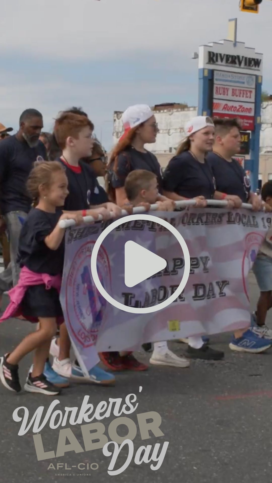 A still of a vertical video of children marching in a Labor Day parade with the words, “Workers’ Labor Day | AFL-CIO” 